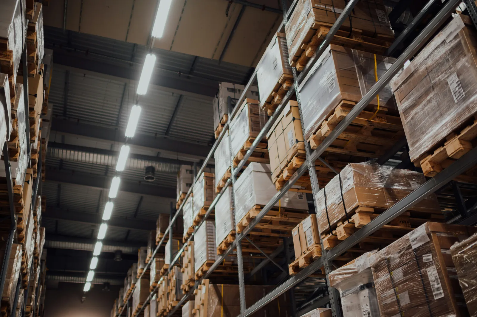 Warehouse shelves with palletized inventory